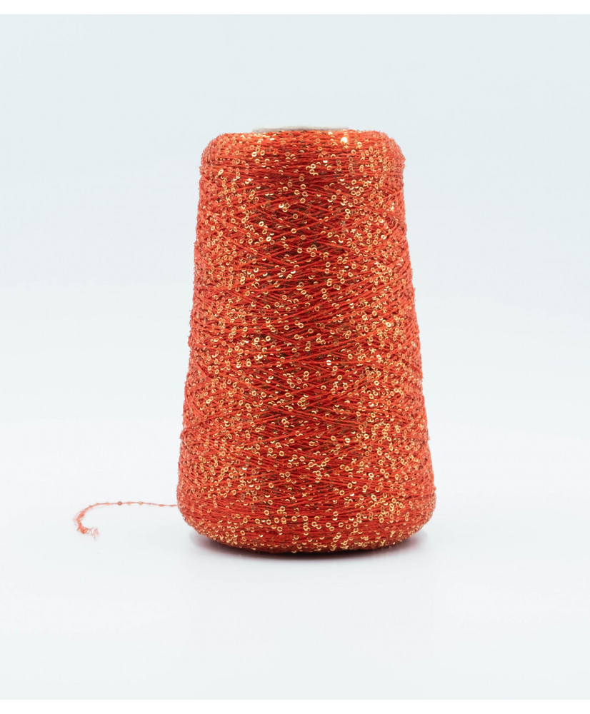 Poliammide 55%  Poliestere 45% paillettes 1 mm