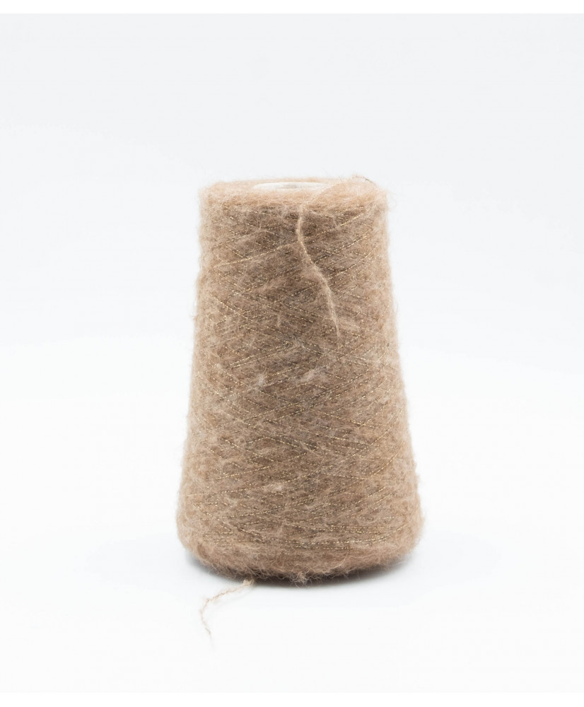 Alpaca 67% Lana 12% Poliammide 15% Poliestere 6%