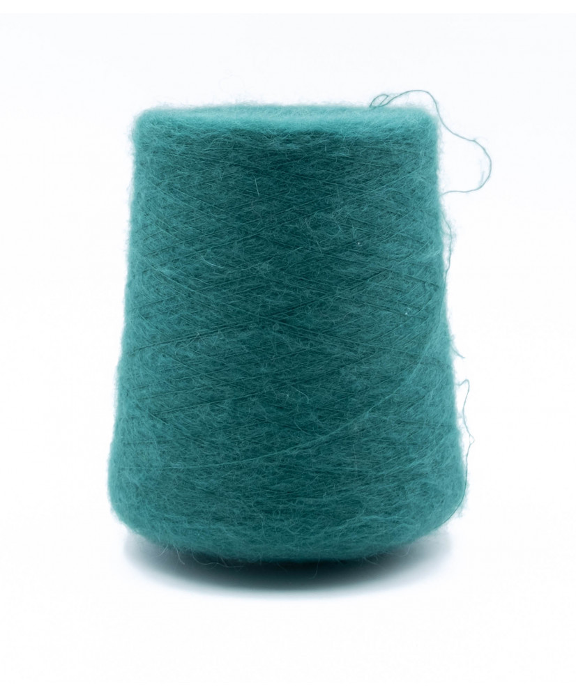 Kidmohair 61% Poliammide 31% Merino 8%