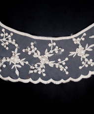 Embroidered neckline with...