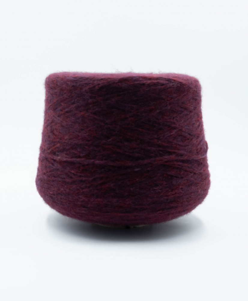 Alpaca 46% Poliammide 34% Lana 20%